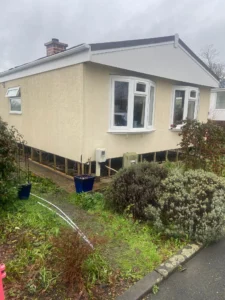 Renovated park home with garden features.